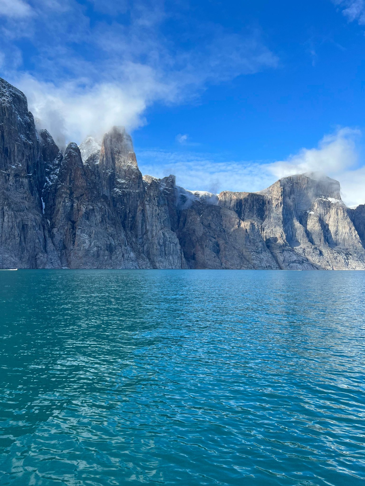 Naujaaraaluit cliff across the bay from Clyde River, Nunavut