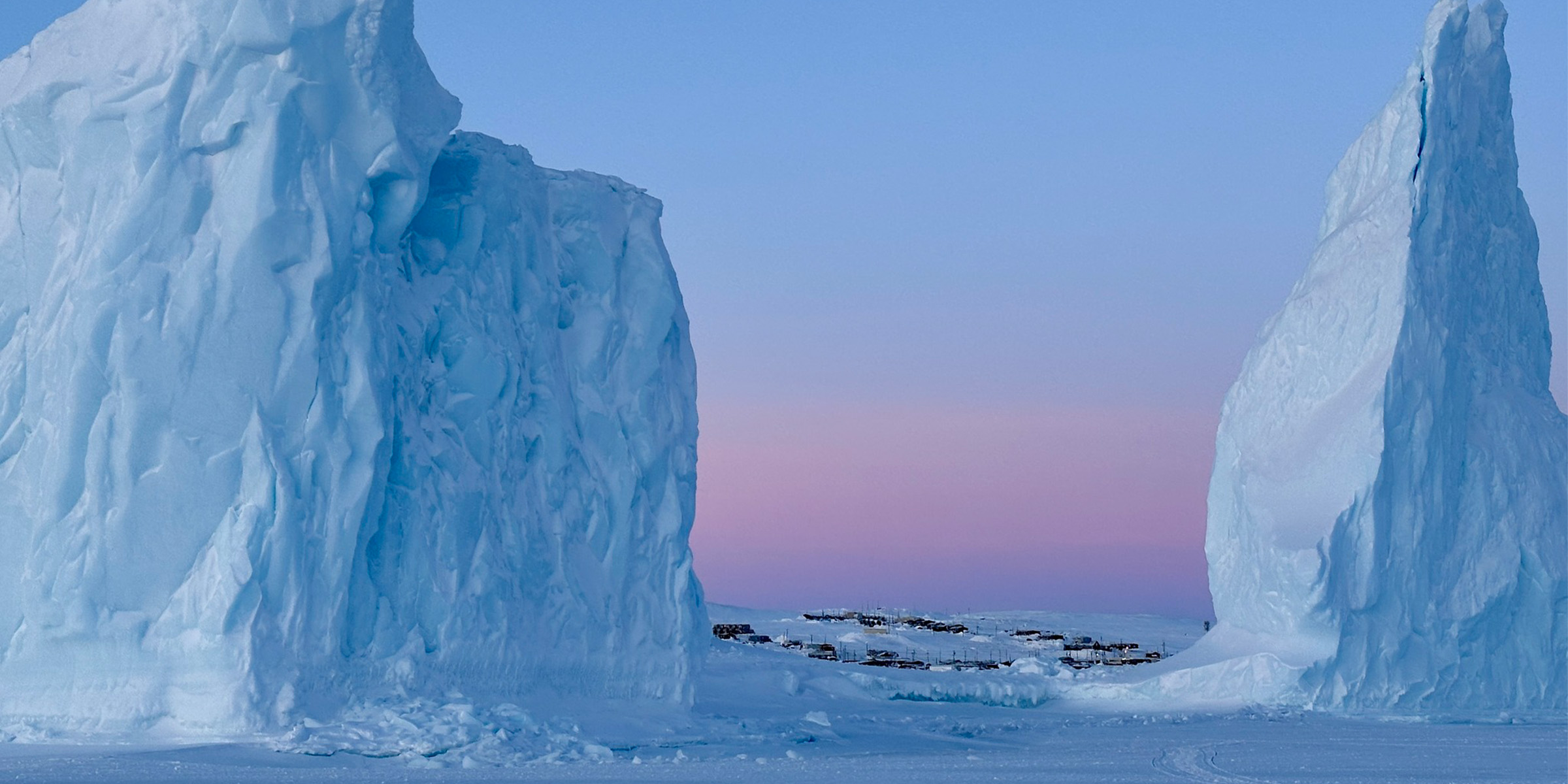 Naujaaraaluit cliff and bay overlooking Clyde River, Nunavut